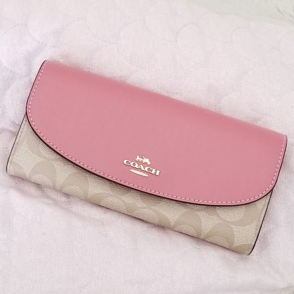 Coach Handbags - 🍒NEW🍒COACH SLIM ENVELOPE WALLET